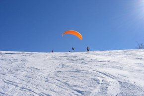 Das Skigebiet Hinterstoder bietet die perfekte Ausgangsbasis für Paragleiter. 