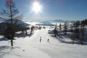skiing on prepared slopes in skiing area Wurzeralm
